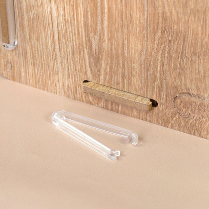 Detailbild der Stiftebox in Holzoptik mit offener clipfritz®-Klammer und Stecköffnung