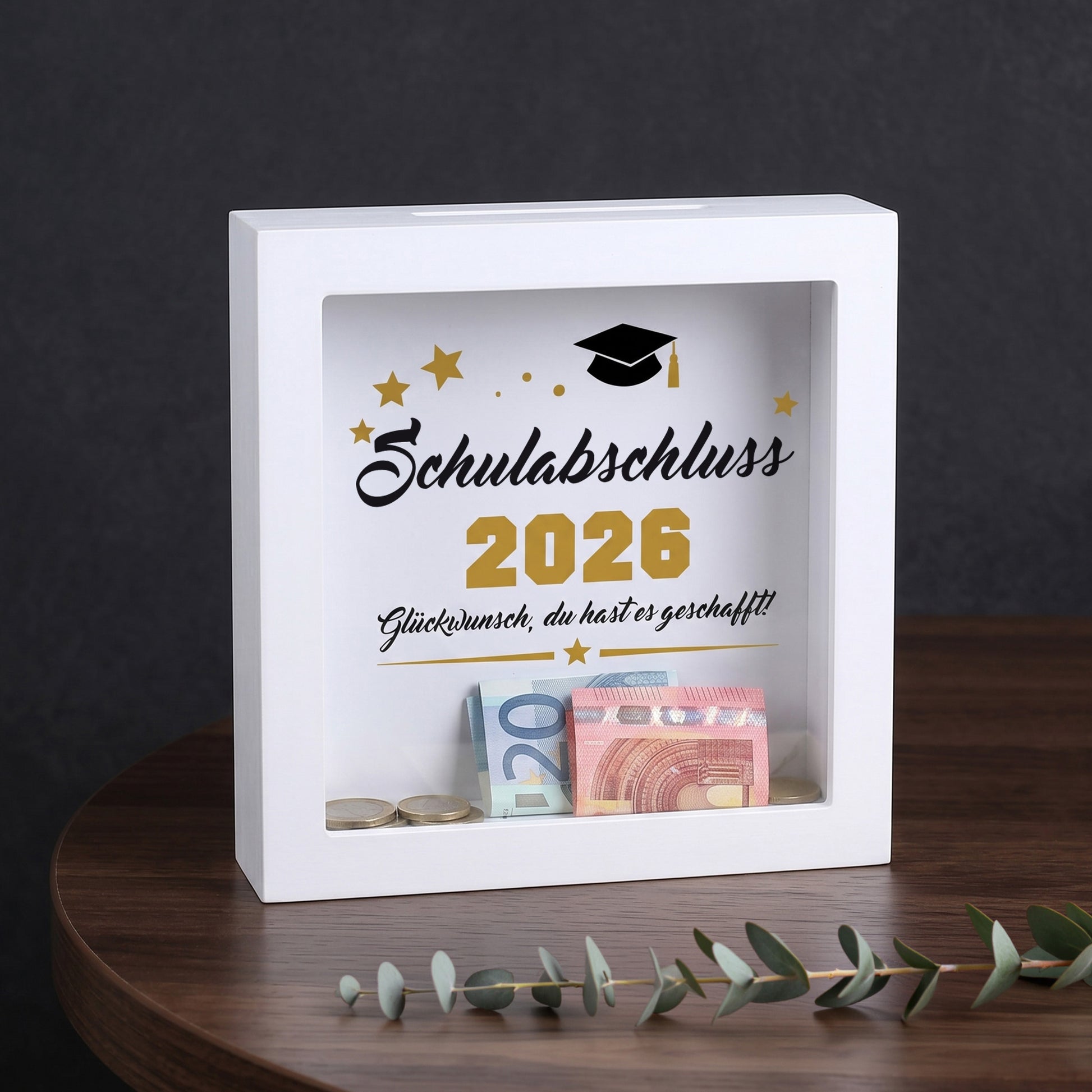 Bilderrahmen-Spardose „Schulabschluss 2026“ mit Geldscheinen und Münzen als Abschlussgeschenk