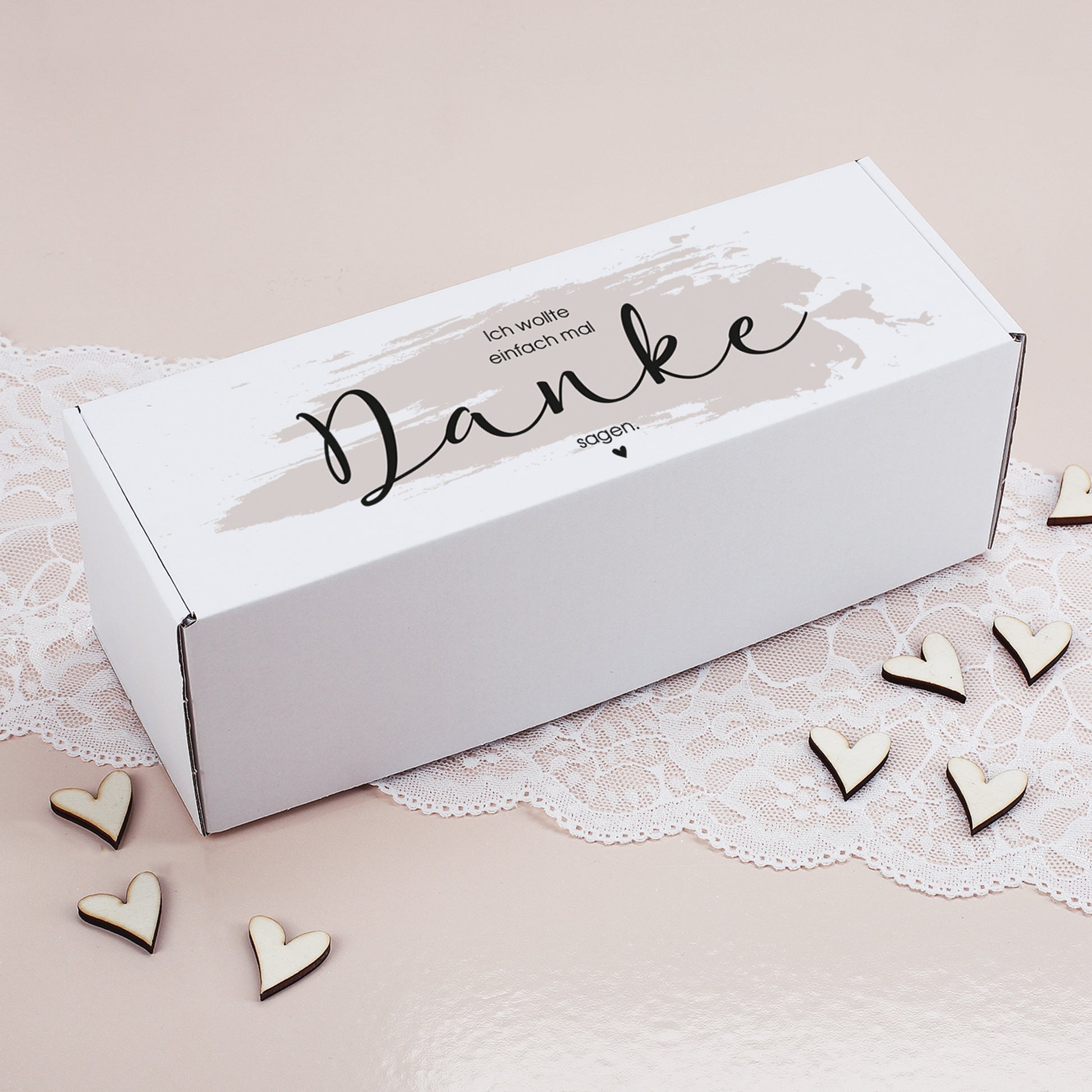 Geschenkverpackung mit Aufdruck „Ich wollte einfach mal Danke sagen“ auf dem Deckel, rechteckig und geschlossen dargestellt.