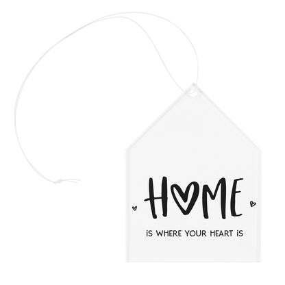 Freigestellter Acrylanhänger in Hausform mit Aufdruck HOME is where your heart is und Band zum Aufhängen