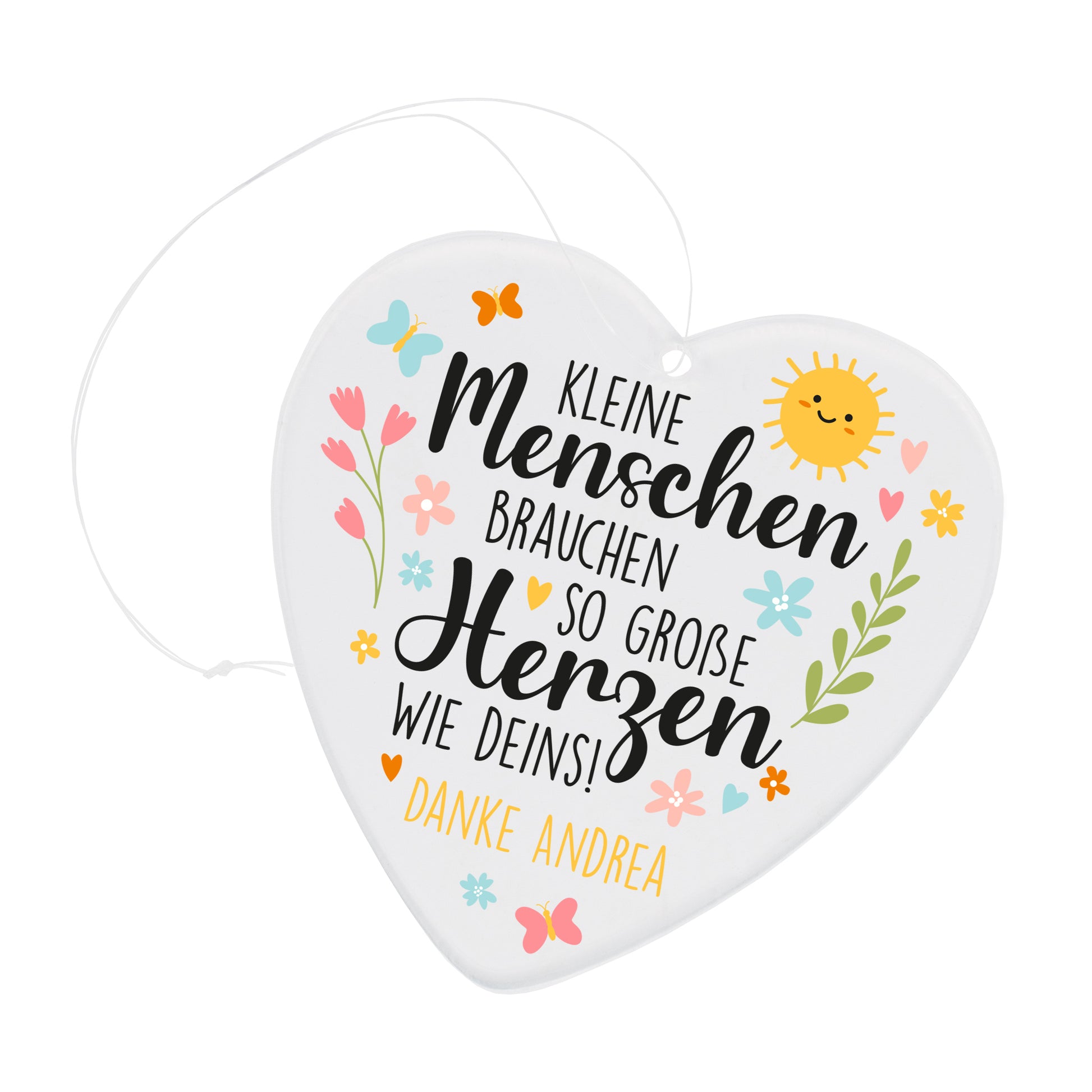 Freigestelltes Acrylherz mit Spruch Kleine Menschen brauchen so große Herzen wie deins und personalisiertem Text Danke Andrea