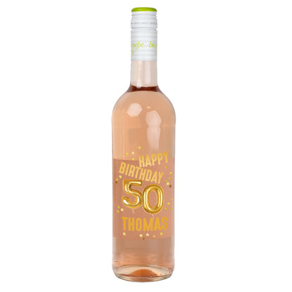 Roséweinflasche mit personalisiertem Etikett „Happy Birthday 50 Thomas“ in goldener Schrift und Ballonoptik