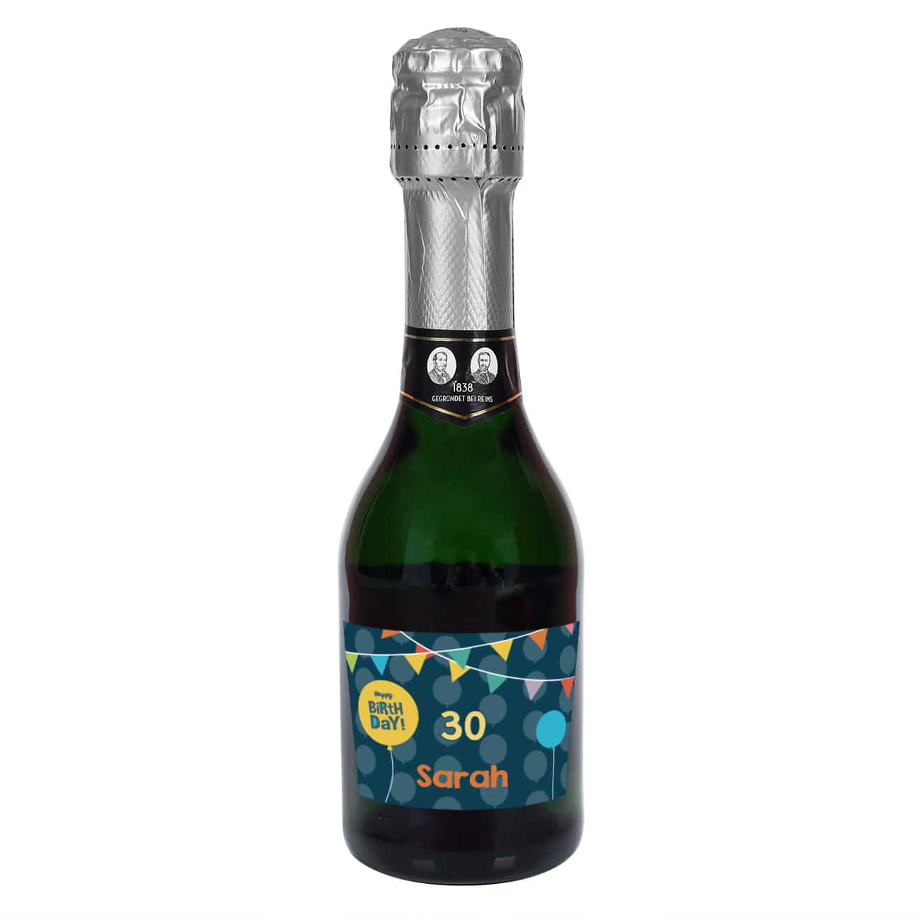 Kleine Sektflasche mit Name und Alter auf dem Etikett zum Geburtstag