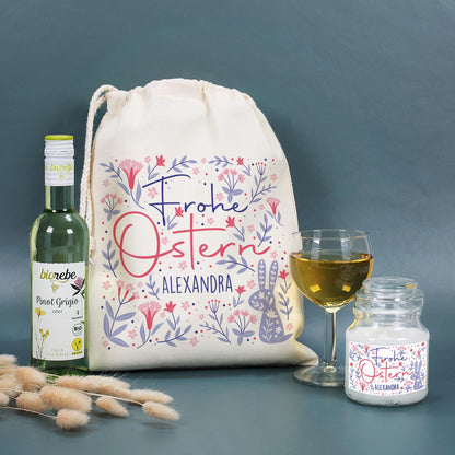 Geschenkset zu Ostern mit Duftkerze und Wein im Geschenksack