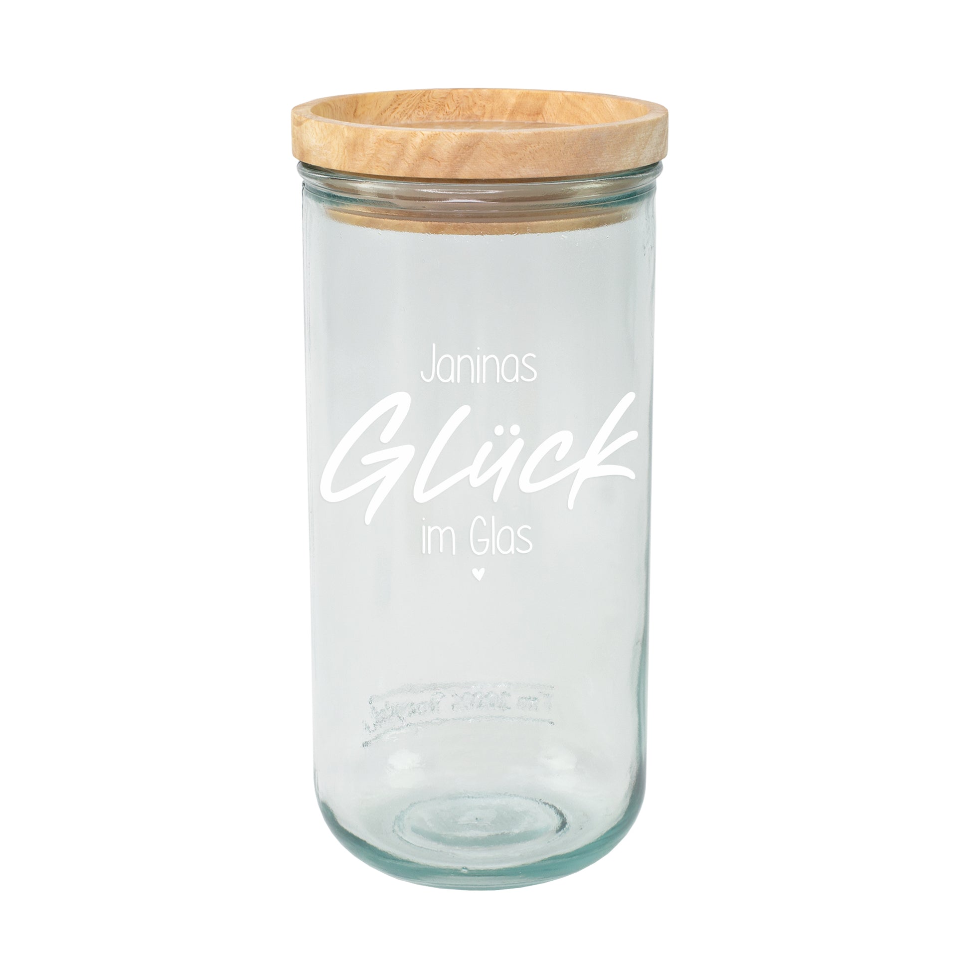 Leeres Vorratsglas mit Holzdeckel und weißem Aufdruck Janinas Glück im Glas auf hellem Hintergrund