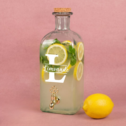 Glas Getränkespender mit goldfarbenem Hahn, Korken und Initiale für Limonade mit Zitronen und Minze