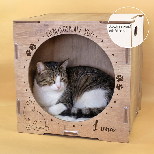 Katzenhaus in Holzoptik mit Katze im Inneren und Hinweis auch in Weiß erhältlich