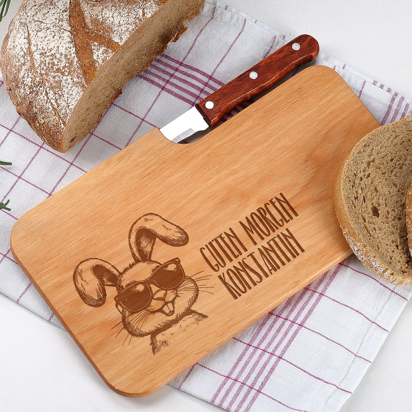 Personalisierbares Messerbrett aus Holz mit Oster-Motiv und Wunschtext