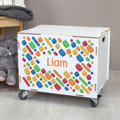 Personalisierte Rollbox aus Holz von clipfritz - Bunte Bausteinwelt | Kinder-Spielzeugkiste mit Name