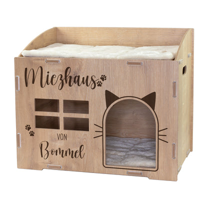 Katzenhaus aus Holz in Eiche mit Miezhaus-Aufdruck, Fensterdesign, Katzenöffnung und Kuschelkissen