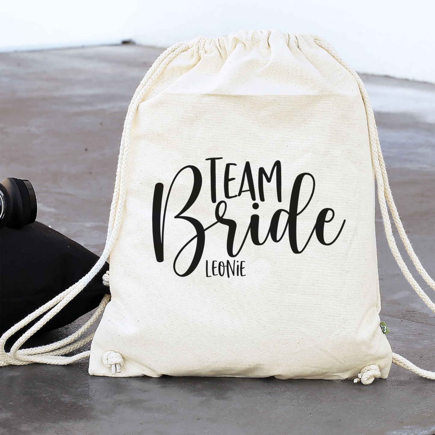 JGA Baumwoll-Rucksack mit Wunschname | Team Bride | Schwarz & Natur
