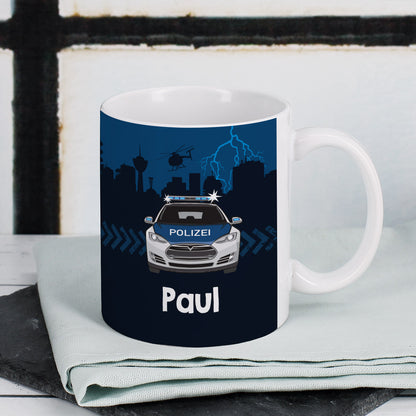 Keramiktasse mit Polizeiautos und Ihrem Wunschnamen gestaltet