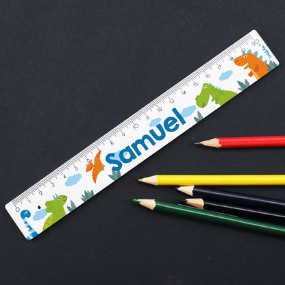 Lineal mit Dinosaurier Motiv und Namensaufdruck