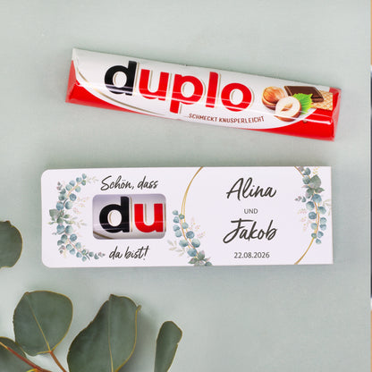 duplo Riegel und personalisierte Verpackung mit Namen des Brautpaares nebeneinander