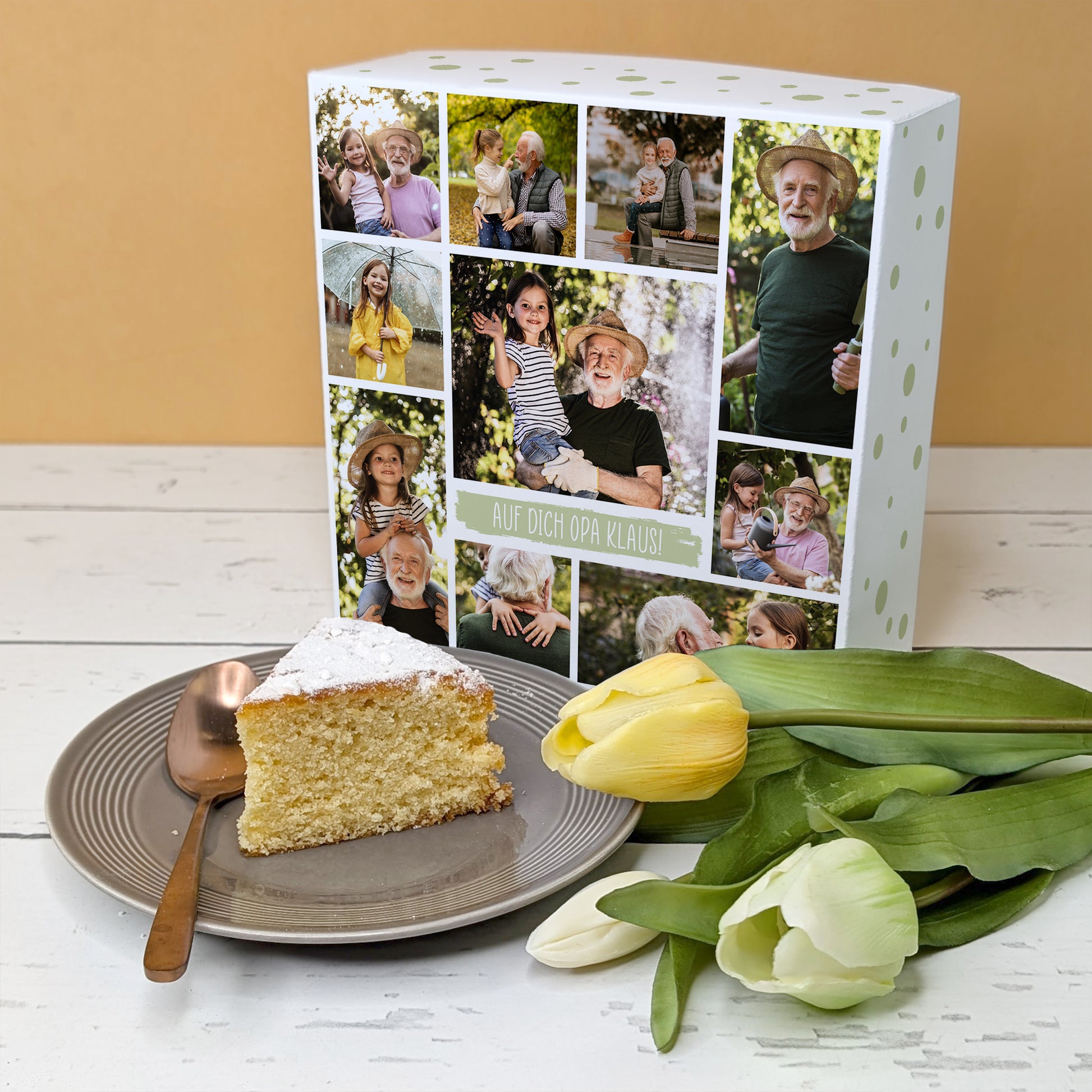 Kuchenstück mit Tulpen und Geschenkbox – angerichtet auf einem Tisch