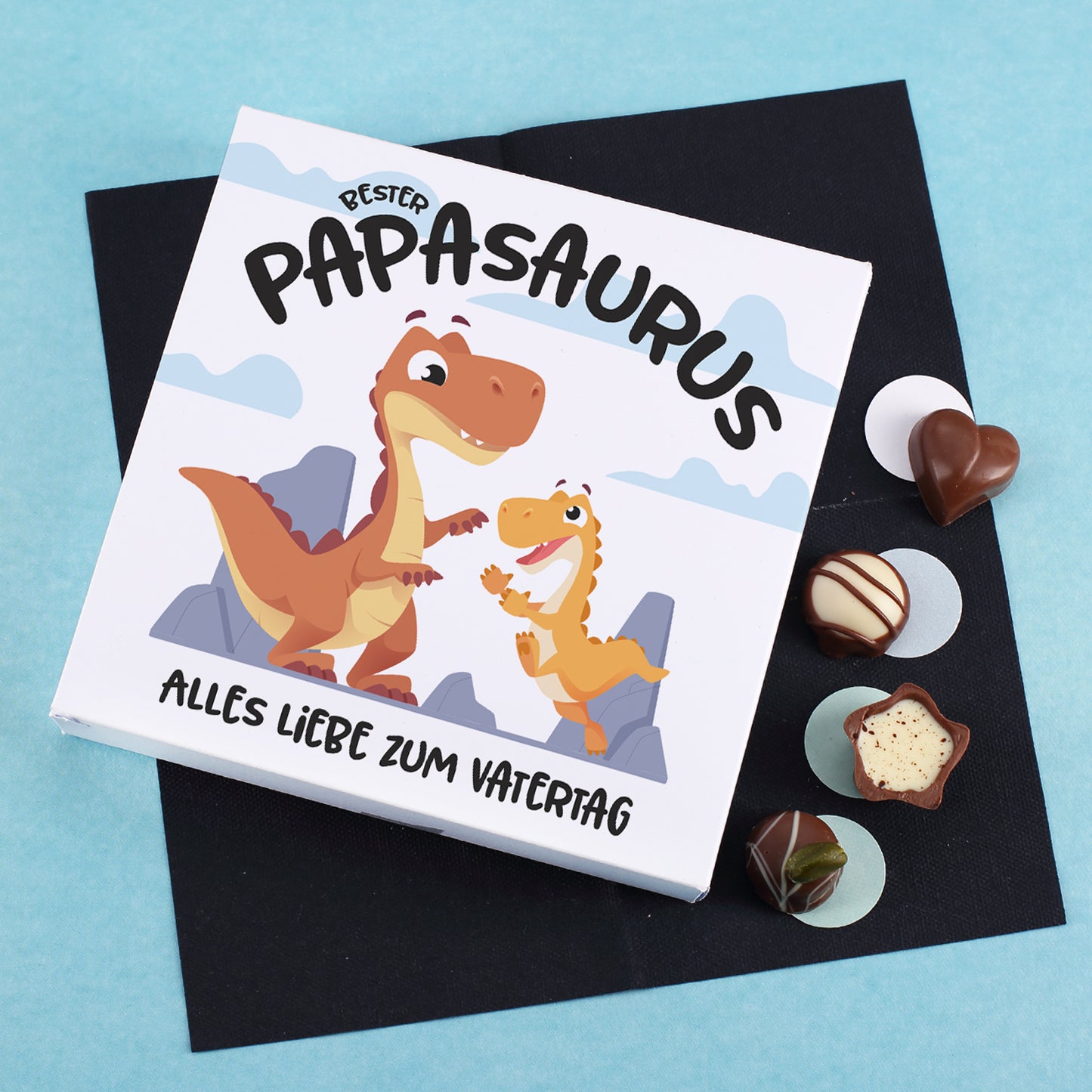 Lindt Pralinen Geschenkbox mit Papasaurus Motiv und Schriftzug „Alles Liebe zum Vatertag“