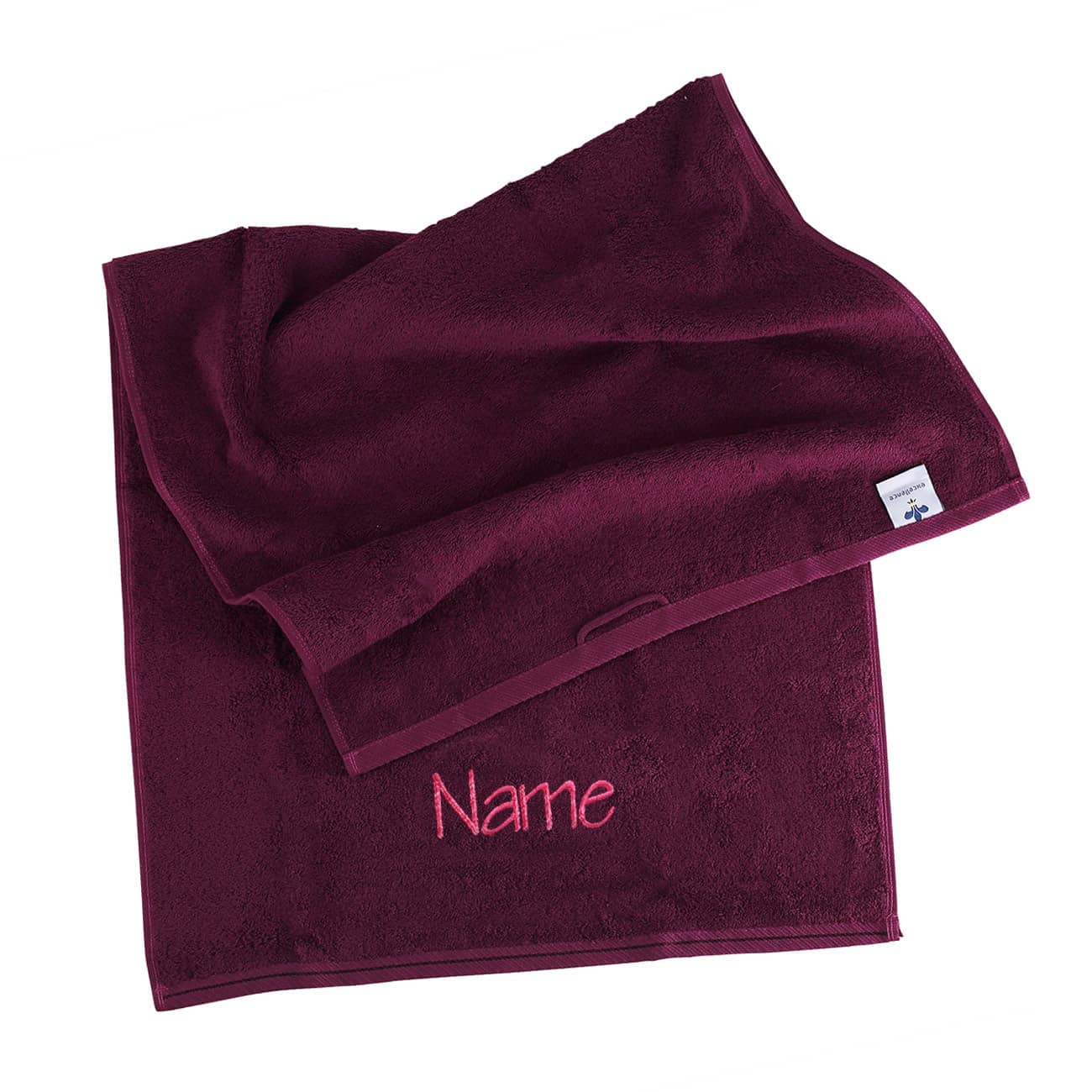 Brombeerfarbenes Handtuch mit Name bestickt in rosa