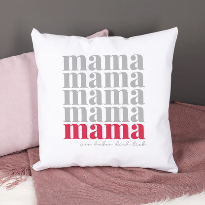 Personalisiertes Mama Kissen als Muttertagsgeschenk auf Sofa mit rosa Decke