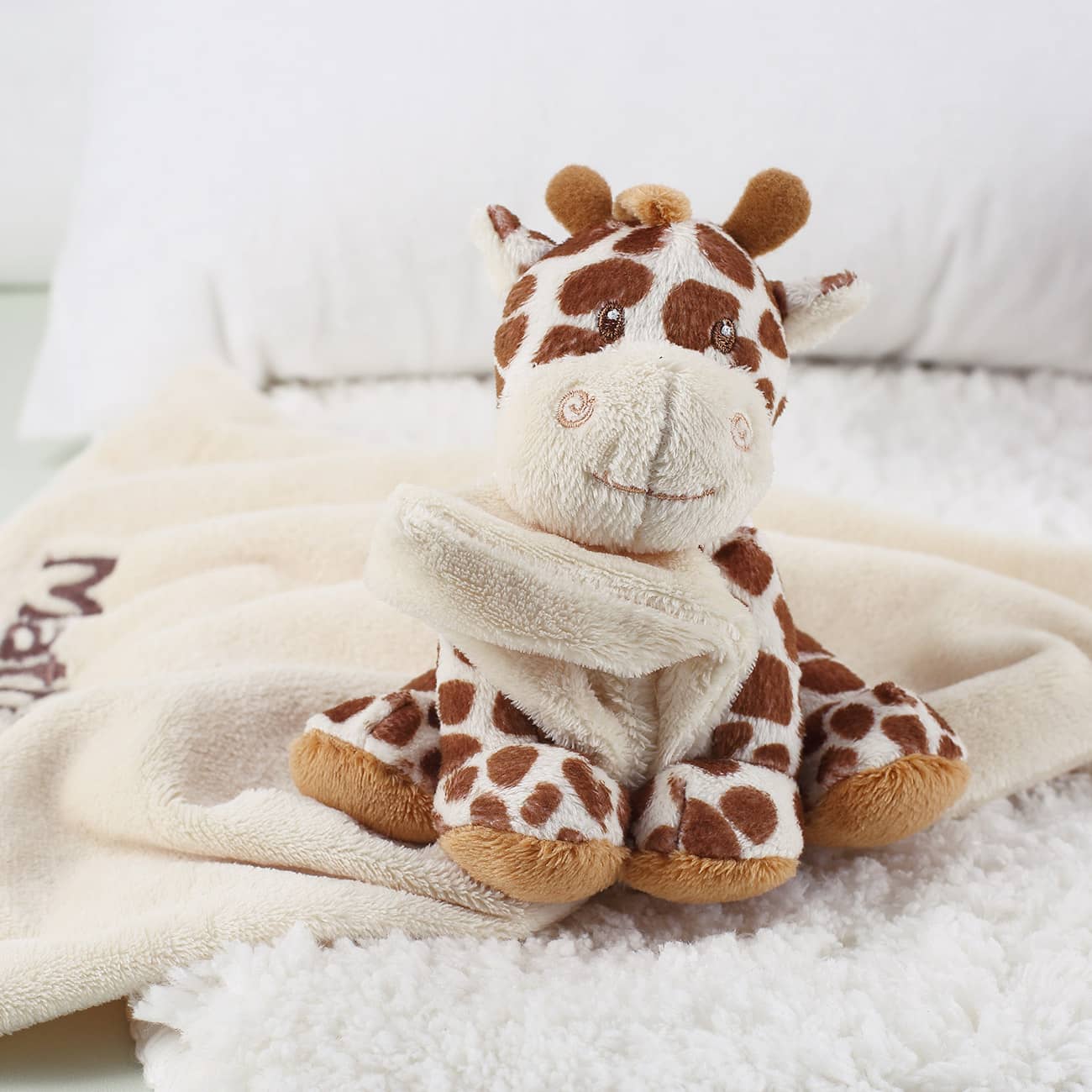 Giraffe mit eingebauter Rassel