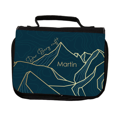 Schwarzer Kulturbeutel mit Bergmotiv, topografischem Muster, goldfarbenen Linienbergen und personalisiertem Namen Martin